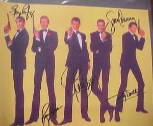 JAMES BOND- FIVE 007's autographed 11 X 14 photo by ALL 5 STARS!