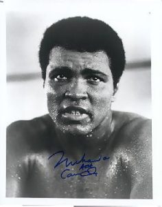 Muhammad Ali- young pose signed "CASSIUS CLAY"!